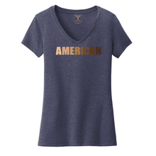 Load image into Gallery viewer, Heathered navy women's v-neck cotton/poly short sleeve graphic t-shirt with "American" printed in a gradient of skin tones.