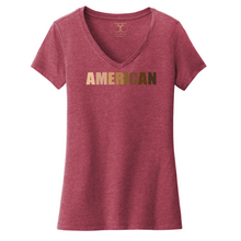 Load image into Gallery viewer, Heathered cardinal red women's v-neck cotton/poly short sleeve graphic t-shirt with "American" printed in a gradient of skin tones.