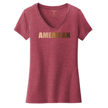 Load image into Gallery viewer, Heathered cardinal red women&#39;s v-neck cotton/poly short sleeve graphic t-shirt with &quot;American&quot; printed in a gradient of skin tones.
